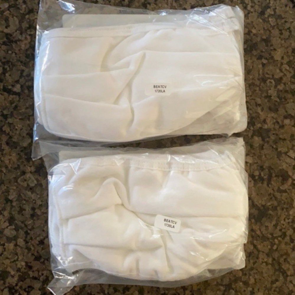2 five pack cotton white masks for kids​